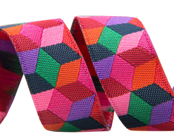 Tumbling Blocks in red, violet and pink by Kaffe Fassett